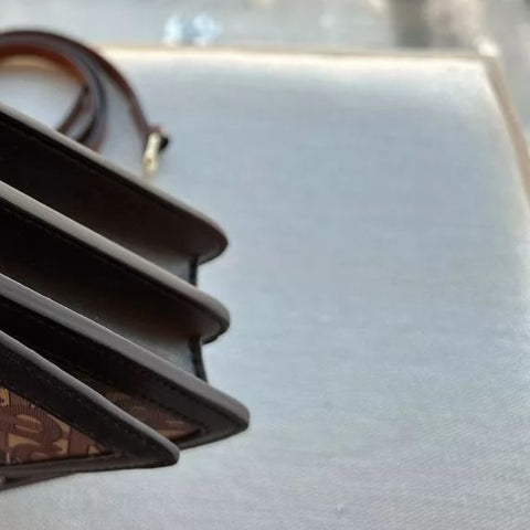 Statement Monogram Leather Crossbody Bag